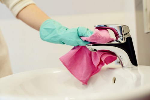 Professionals cleaning a kitchen during end of tenancy cleaning